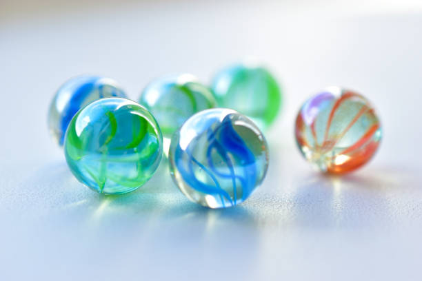 istock Decorative multicolored glass balls on a white background 1280203325
