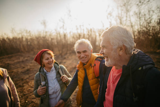 istock Group of senior people hiking together 1280204604