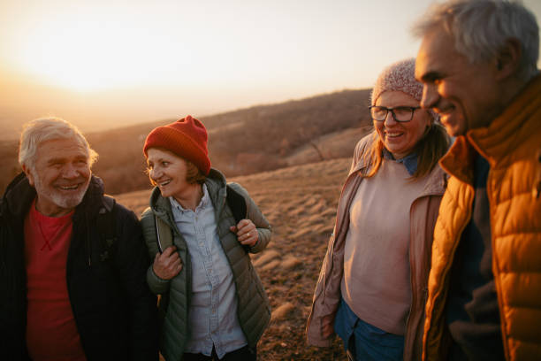 istock Group of senior people hiking together 1280204657