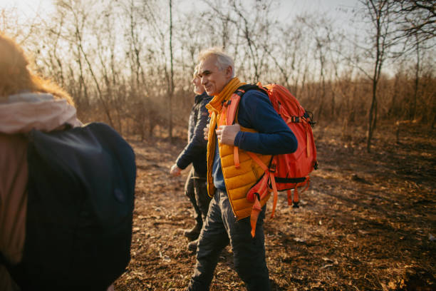 istock Group of senior people hiking together 1280204734