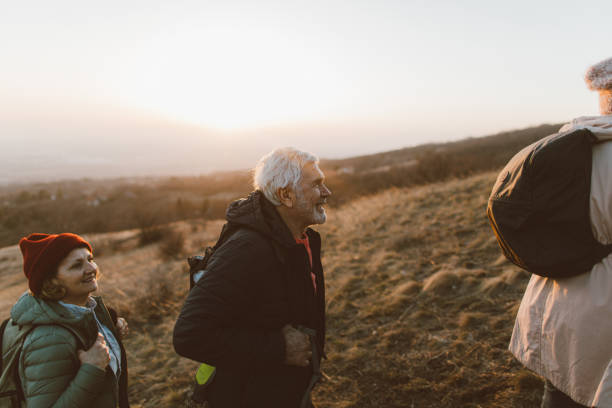 istock Group of senior people hiking together 1280204896
