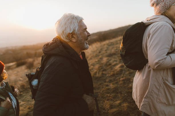 istock Group of senior people hiking together 1280204927