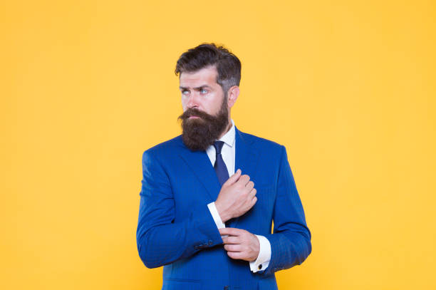 istock Because you worth it. Handsome guy concept. Confident businessman handsome bearded man in formal suit. Successful handsome hipster top manager. Serious motivated entrepreneur. Barbershop and stylist 1280205747