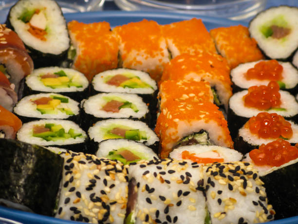 istock plate with various kinds and types of sushi 1280205756