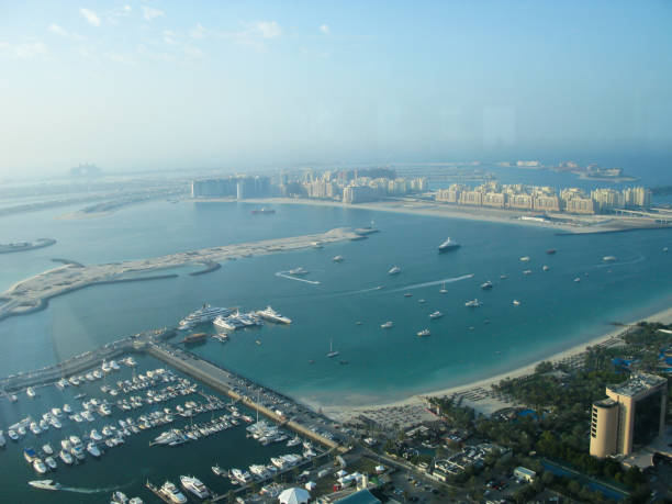 view from top point to the Persian Gulf view from top point to the Persian Gulf, the island of Palma, marina and the Atlantis hotel, Dubai, UAE dubai island stock pictures, royalty-free photos & images