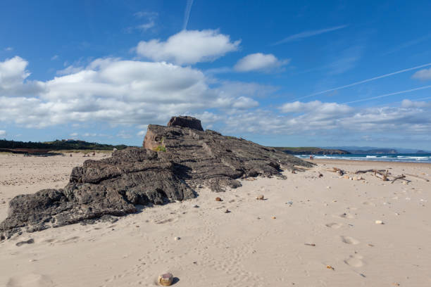 istock Cliffs and sea rock on a beach, blue sky 1280207276