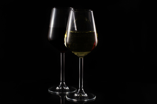 wine glasses on black background