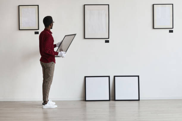 istock African Man Planning Art Gallery Set Up 1280209535