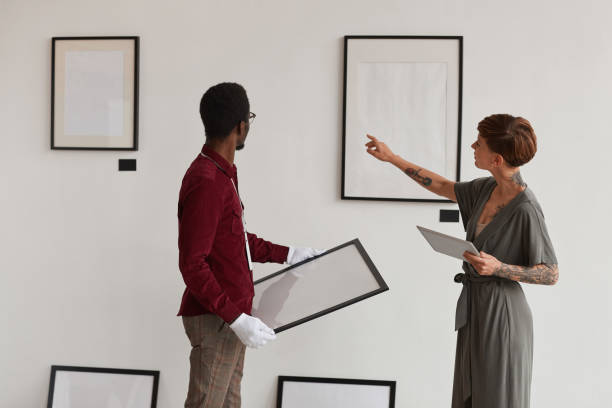 istock Female Manager Planning Exhibition in Museum 1280209569