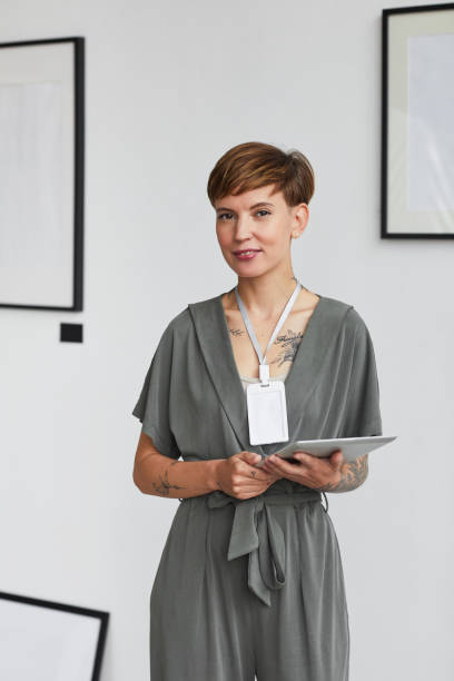 istock Female Art Gallery Manager 1280209575