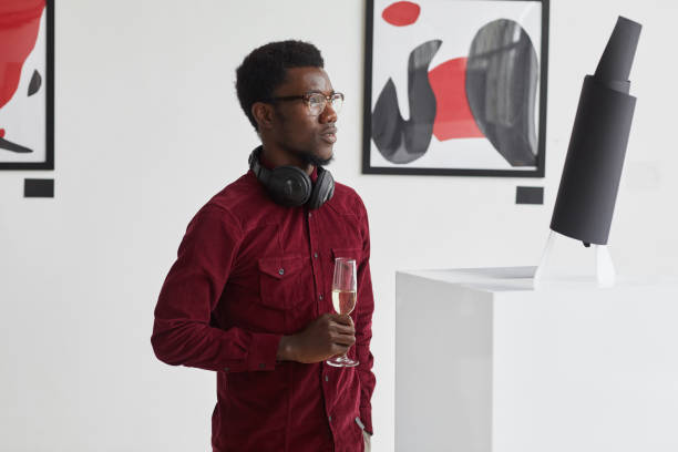 istock African-American Man Visiting Modern Art Museum 1280209668