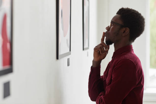 istock African-American Man Looking at Modern Art 1280209674