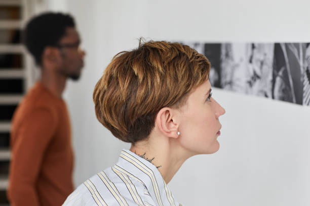 istock Young People Looking at Modern Art in Museum 1280209711