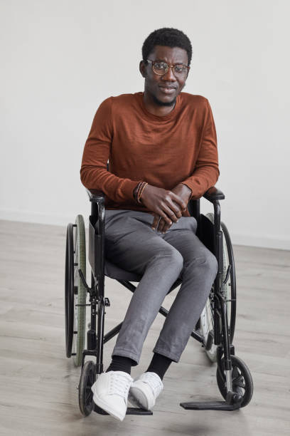 istock Handicapped African-American Man against White 1280209751