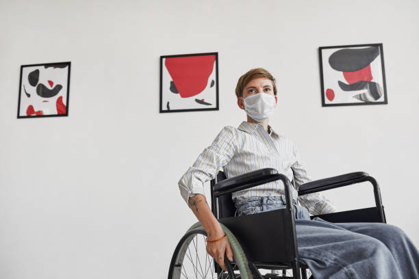 Disabled Young Woman Visiting Art Museum