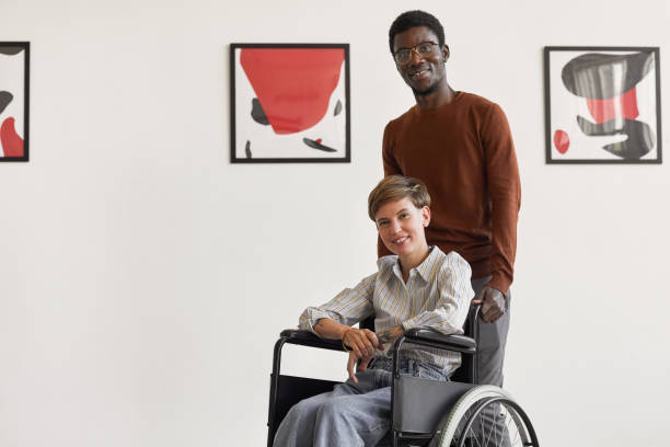 istock Disabled Woman Visiting Art Museum with Caregiver 1280209768