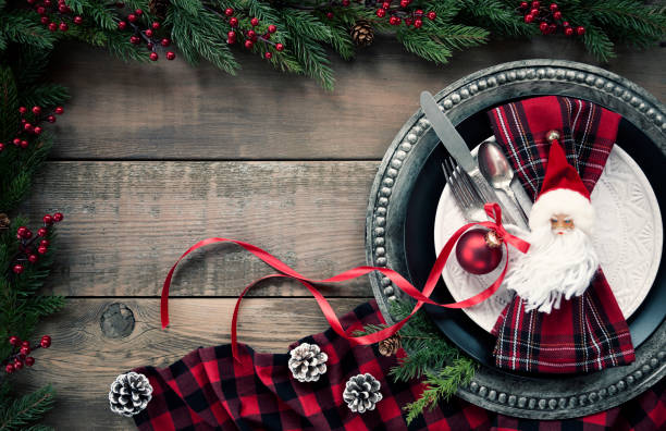 istock Holiday Christmas Dining Plate on an Old Wood Table 1280209926