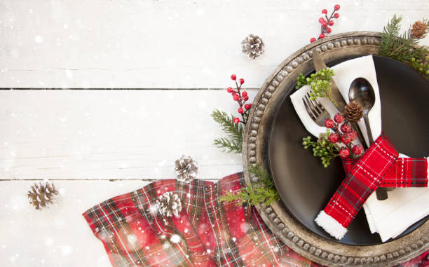 istock Holiday Christmas Dining Plate on an Old Wood Table 1280209948