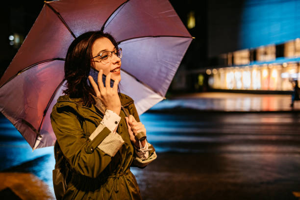 istock Woman talking on phone downtown 1280213139