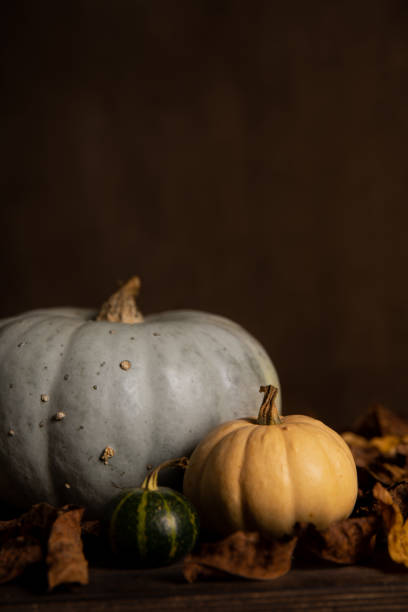 istock Dark autumn pumpkin decoration 1280218238