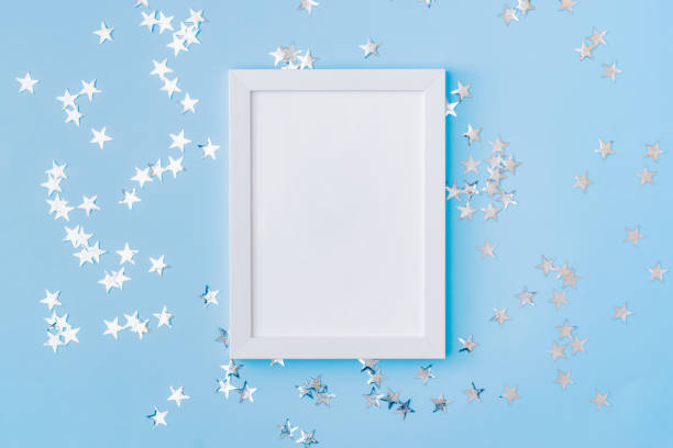 istock Mockup white frame with christmas decorationon a blue background 1280219112