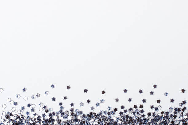 istock Blue confetti on white. Colorful Christmas or holiday background 1280219647