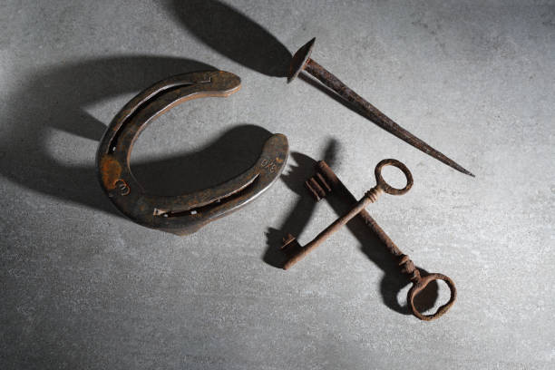Florence - 04/03/2019: horseshoe, rusty nail and old keys