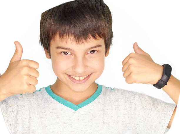 istock a dark haired handsome boy with dark eyes a dazzling smile 1280221636
