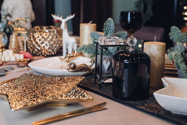 istock Thanksgiving table setting among white candles and cones 1280222569