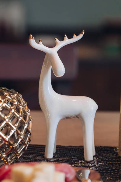 istock White deer figurine on the festive table 1280222572