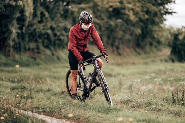 istock cyclist wearing the face mask during the lockdown 1280225544