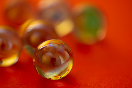Marbles on red.