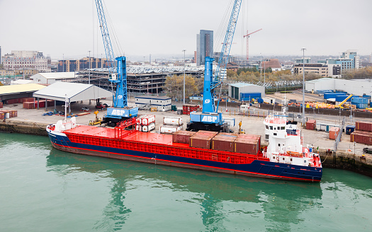 Southampton, England - October 29, 2016:  An Irish registered general cargo ship named Huelin Dispatch is docked in the port of Southampton.