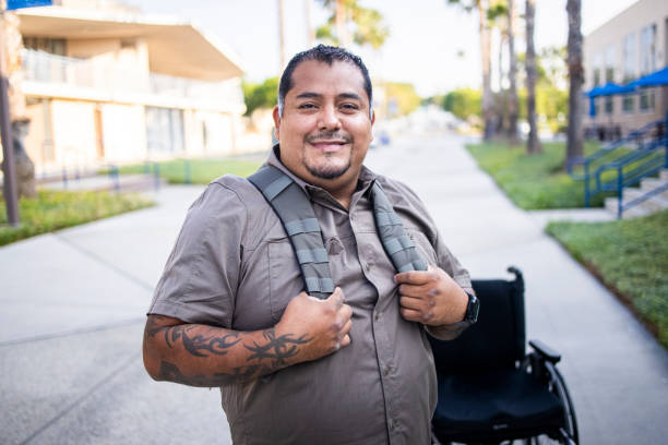 istock Hispanic American Veteran College Student Walking on Campus 1280228370