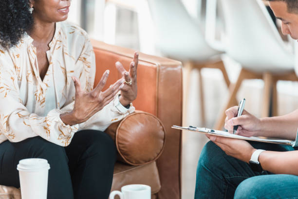 istock Unrecognizable woman gestures emphatically as therapist takes notes 1280235890