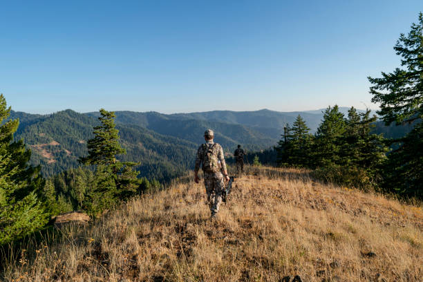 Crossbow hunters hiking