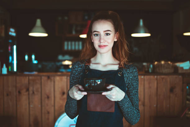 istock Small business: Happy owner of a cafe. 1280242205