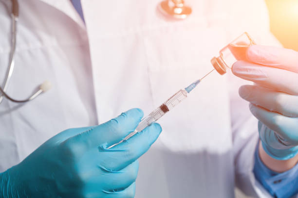 istock Doctor holding a viol with vaccine against corona virus. 1280243636