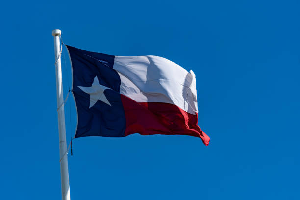 istock Texas State Flag - Flying over Dallas, TX 1280244704