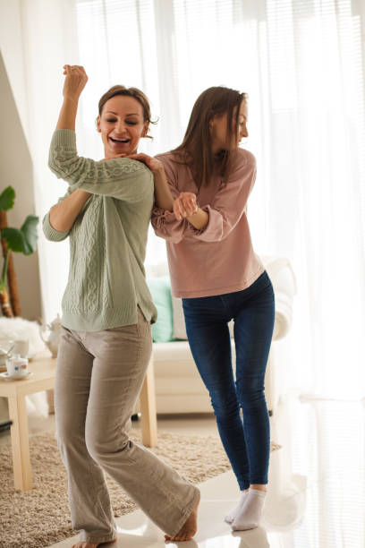 istock Filling time with dance in the living room during quarantine 1280247012