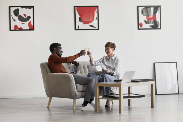 istock Business Couple Celebrating Success 1280249682