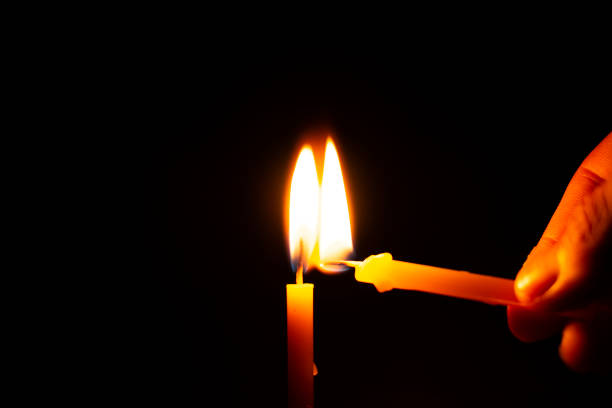 istock Lighting a candle for light Religious worship ideas 1280251444