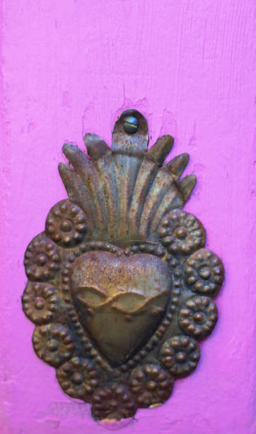 istock Antique Tin Milagros Heart, Pink Background 1280258911