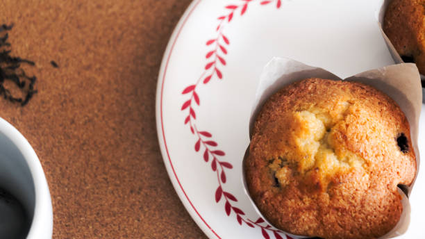 Take a moment to enjoy a delightful and tasty home baked muffin