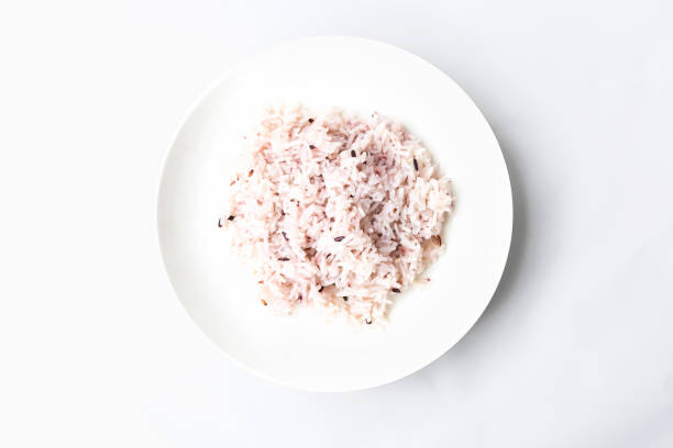 istock Cooked rice on white plate with copy space background - Top view flat lay concept 1280271348