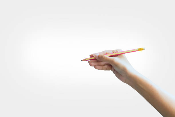 istock Hand with a pencil writing on isolated white background - Clipping path 1280271373