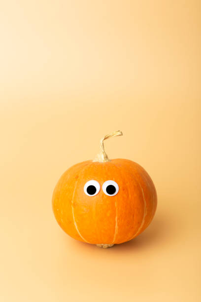 istock Pumpkin minimal concept. Autumn pumpkin on an empty colored background. Thanksgiving and halloween concept 1280280521