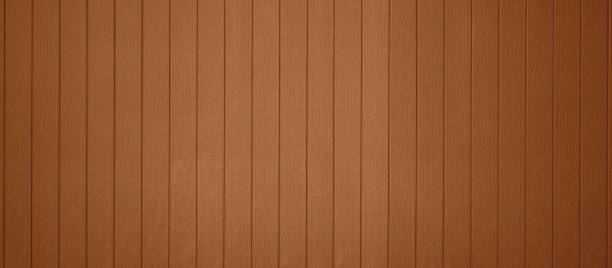 istock Brown wooden fence panels background in vertical pattern 1280281455