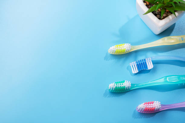 istock Set of 4 new plastic toothbrushes 1280282697