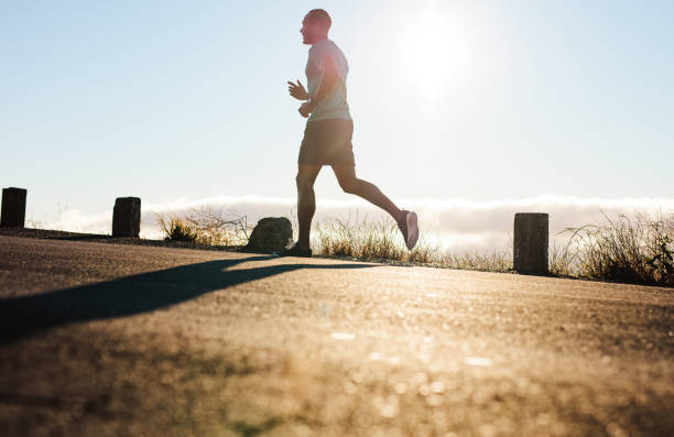 istock Man running on road in the morning 1280282877